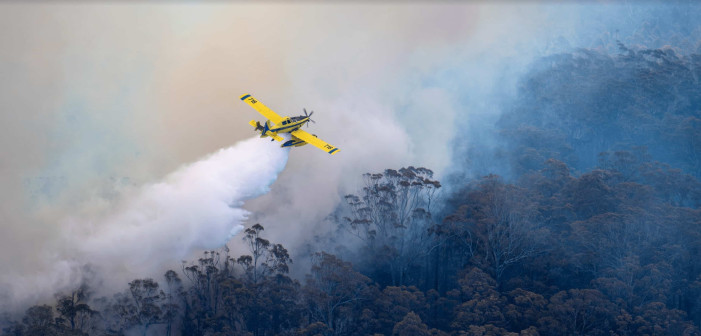 yellow plane fighting wildfires