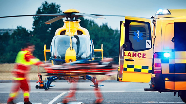 yellow helicopter with yellow ambulance